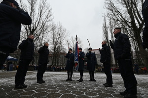 Czterech policjantów w czasie składnia roty ślubowania.