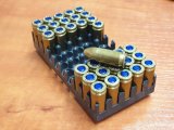 zdjęcie przedstawia koszyk z 32 sztukami amunicji kalibru 9mm - foto poglądowe