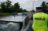 Wizerunek Policjanta kontrolującego ruch.