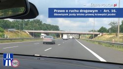 Widok autostrady po której pojazd porusza si e środkowym pasem.