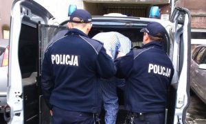 policjanci, zatrzymany, radiowóz - zdjęcie poglądowe