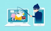 grafika - przestępca z telefonu łowi dane bankowe z komputera