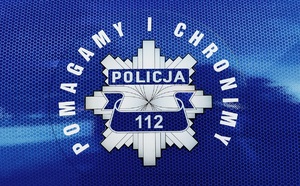 Napis Policja &quot;Pomagamy i Chronimy&quot;