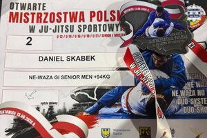 Dyplom i medal rudzkiego policjanta